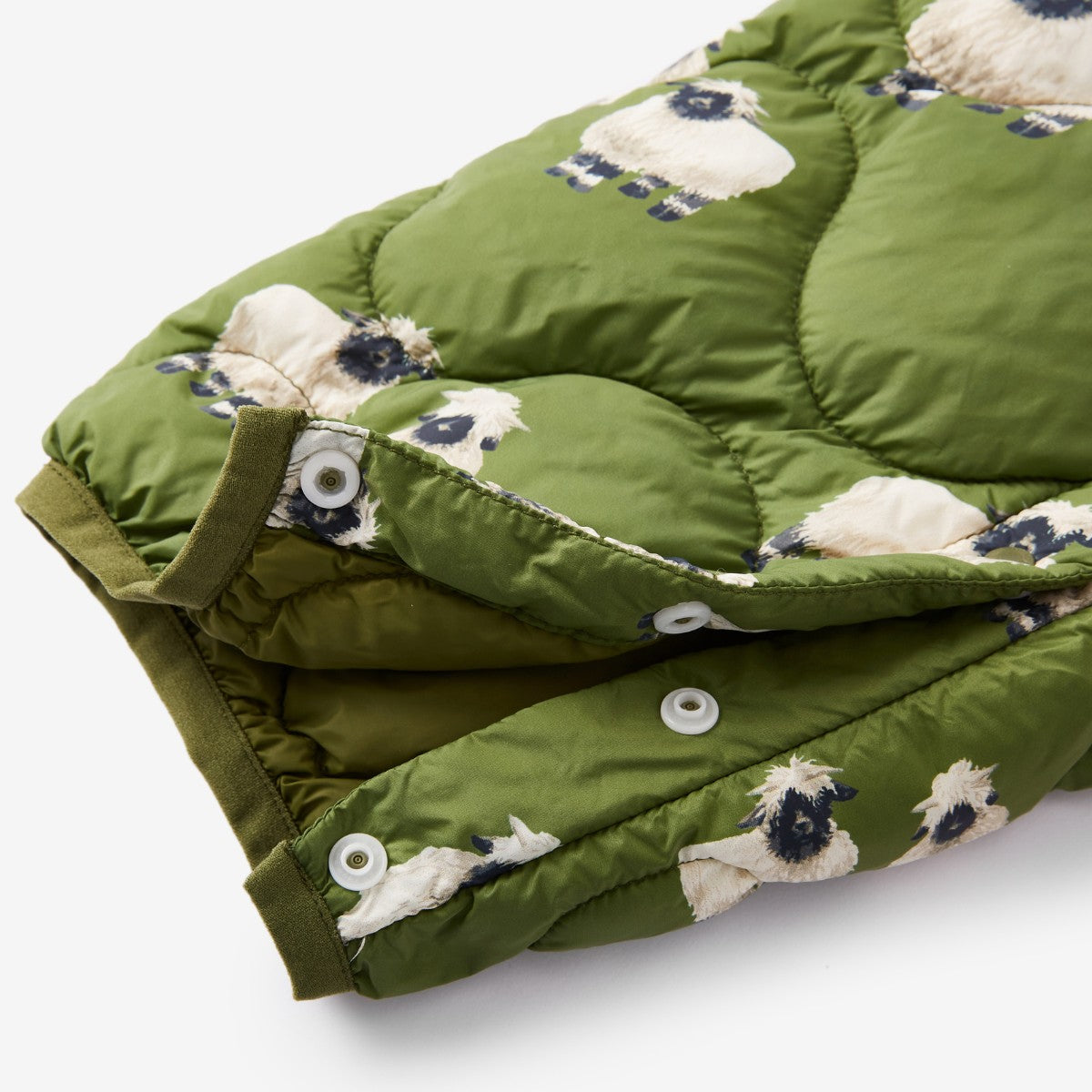 Valais Sheep Lightweight Down Hooded Jumpsuit Sleeve Button Detail