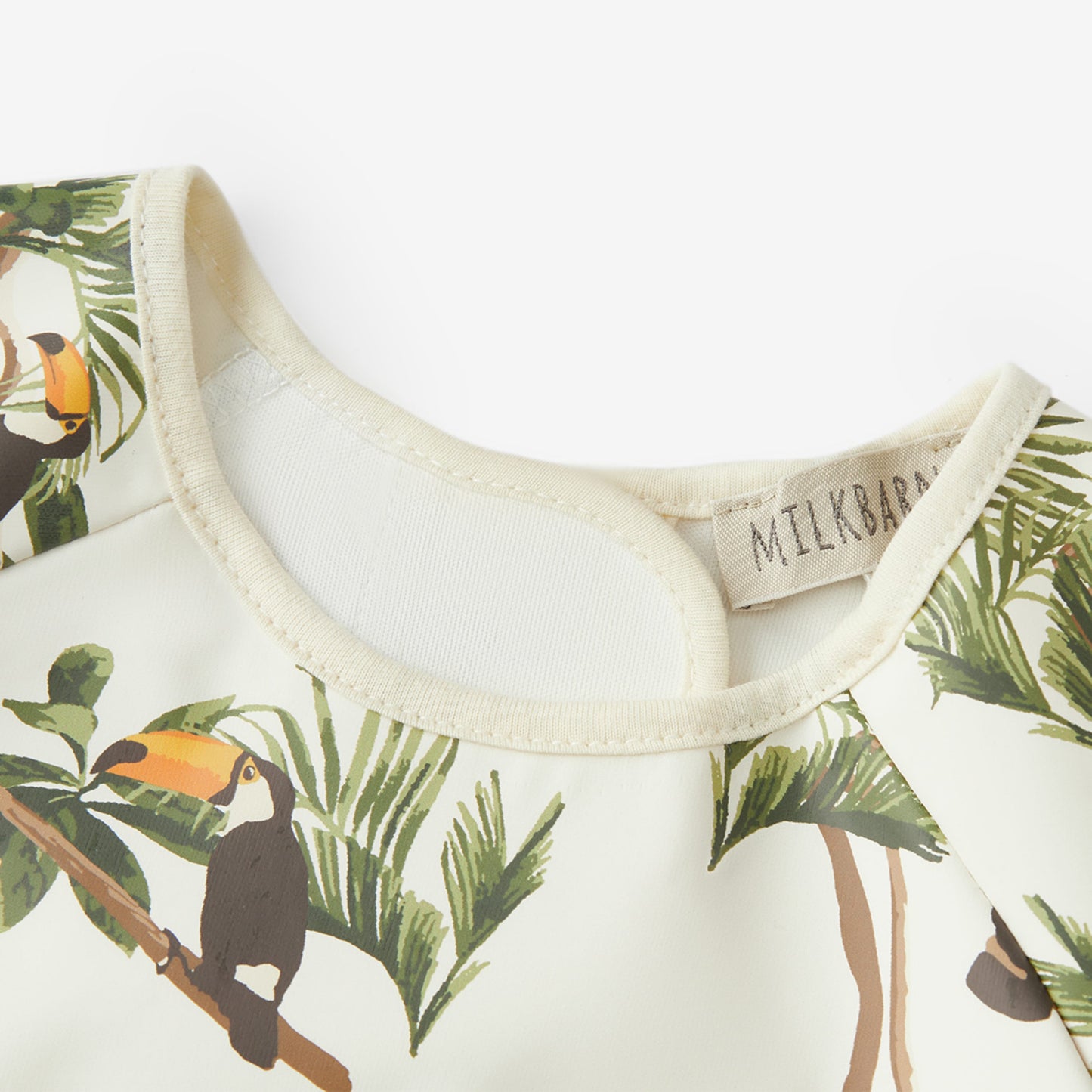 White Toucan Long Sleeve Pocket Bib