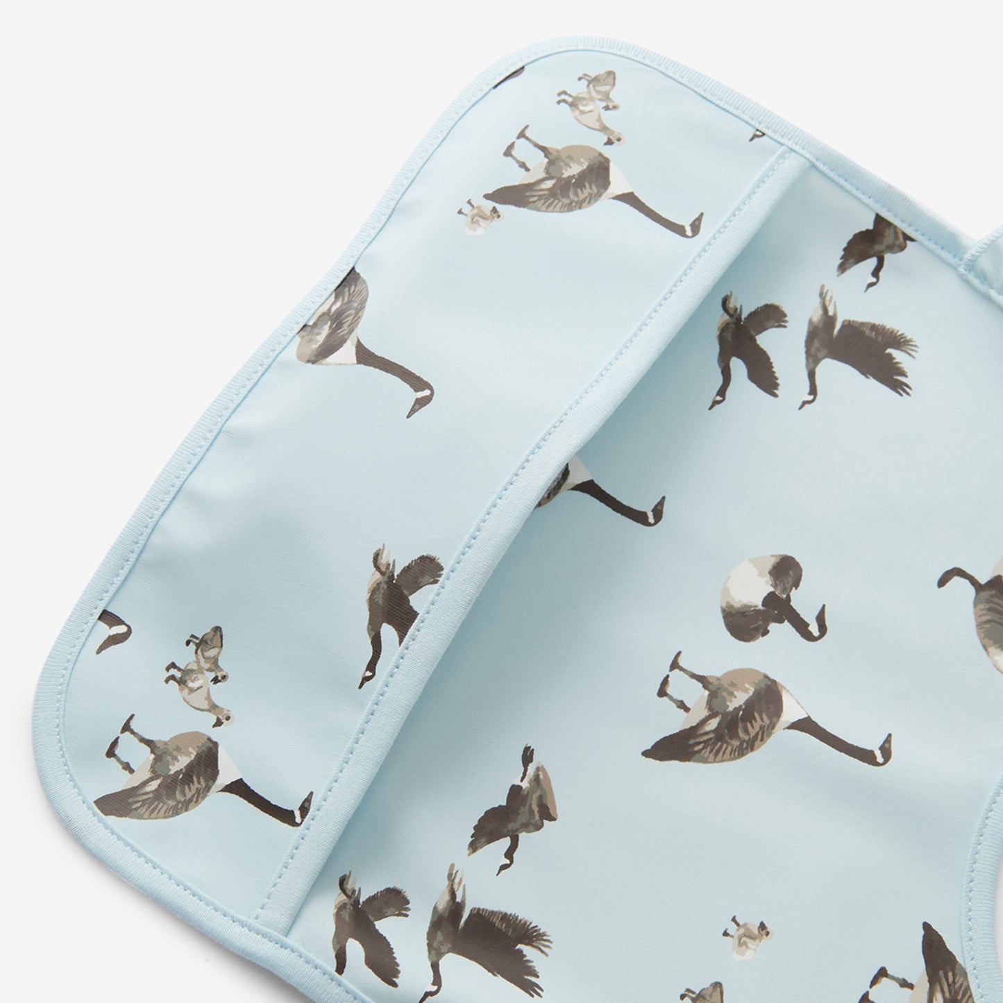 Goose Ruffle Pocket Bib