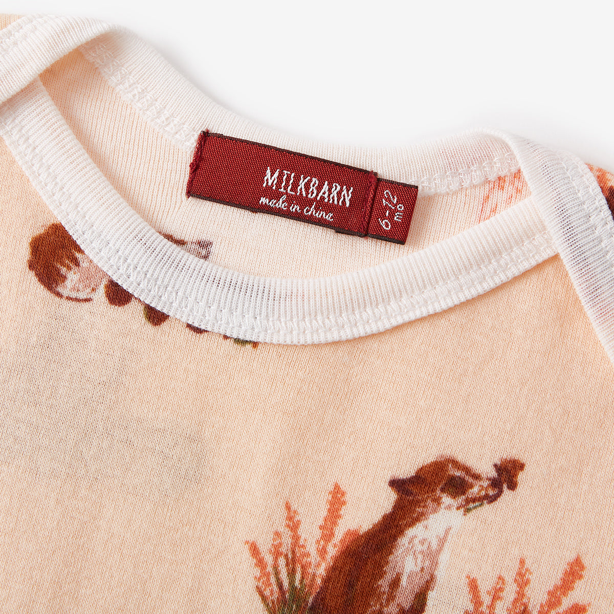 Milkbarn Kids Organic Knit Cotton Long Sleeve One Piece baby Apparel One Piece in Floral Fox fabric Detail
