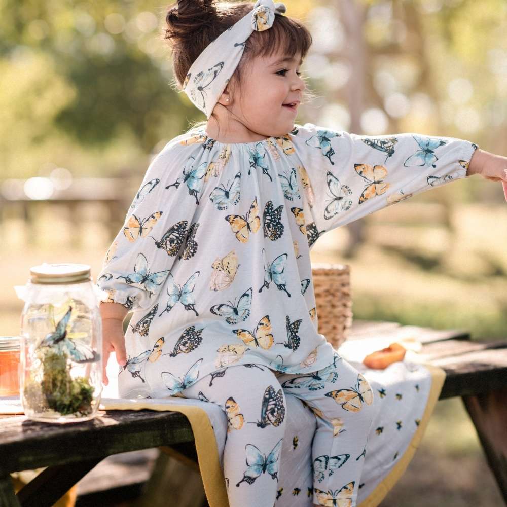 Milkbarn Kids Organic Knit Cotton Dress & Legging Set baby Apparel Dress in Natural Vintage Ski fabric Shot