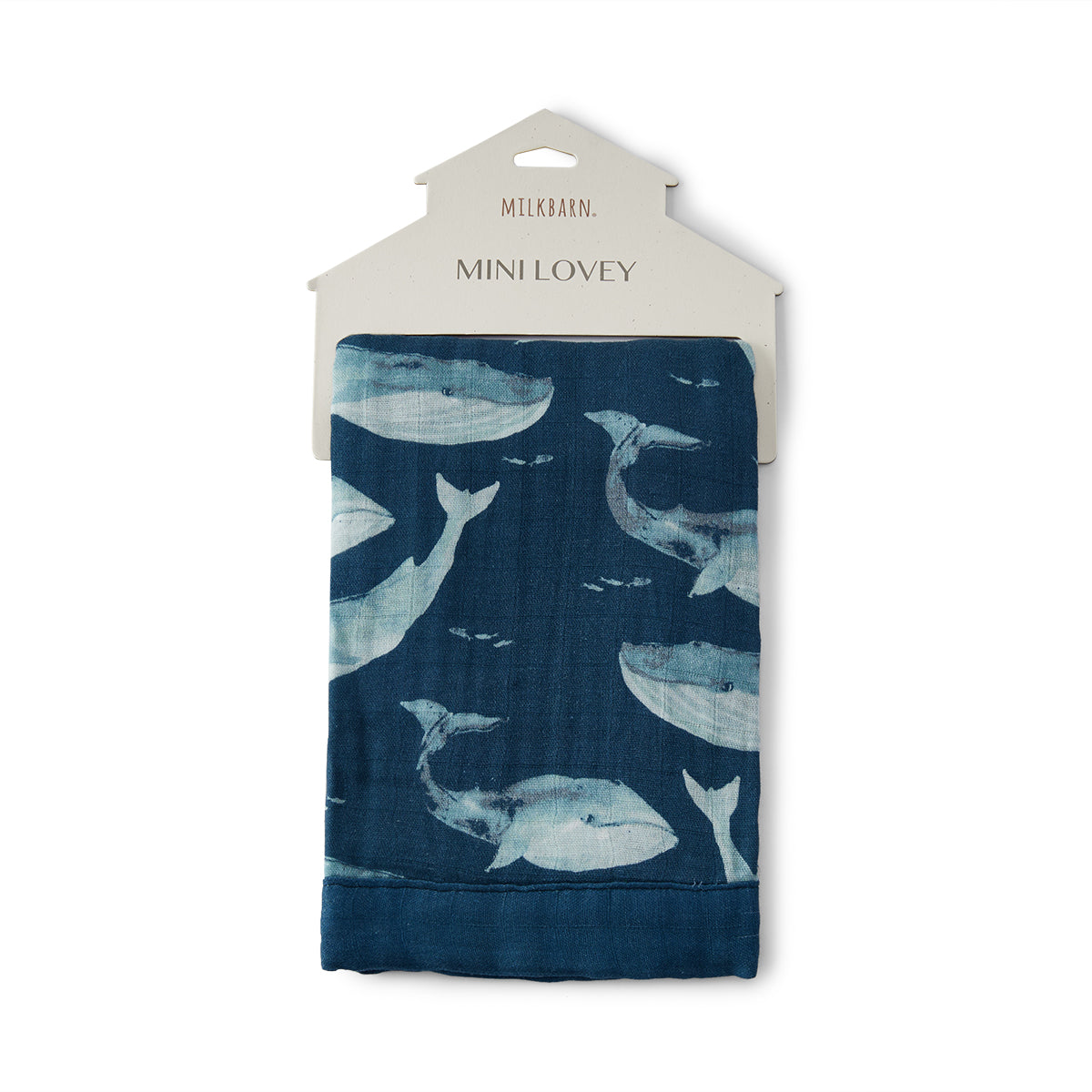Milkbarn Blue Whale Mini Lovey Two-Layer Muslin Security Blanket in Milkbarn paper hanger packaging, bamboo cotton muslin with whale print and dark blue trim