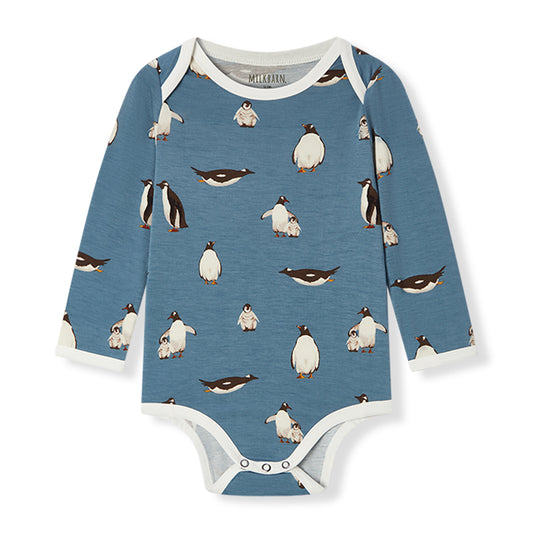Soft and stretchy Luxe Stretch long sleeve baby one piece in blue with penguin print