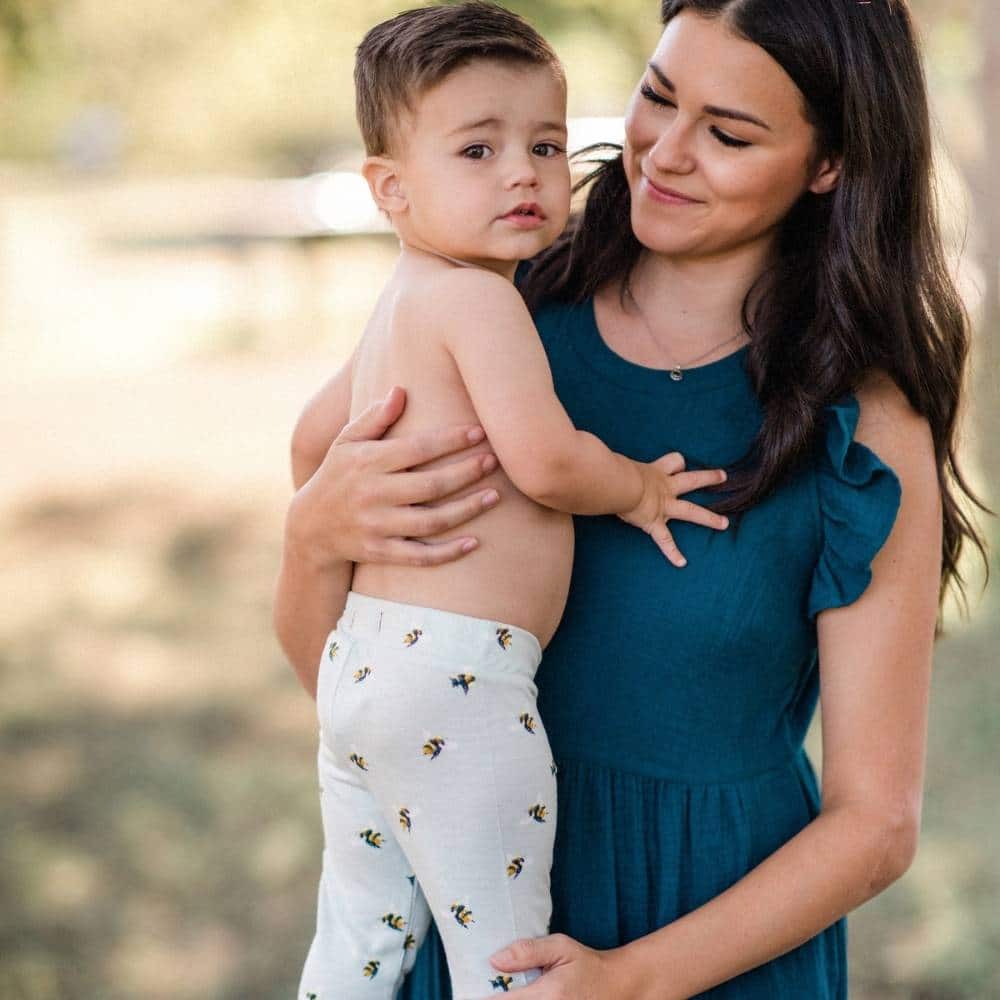 Baby Boy and Mom Wearing Bumblebee Bamboo Leggings by Milkbarn Kids