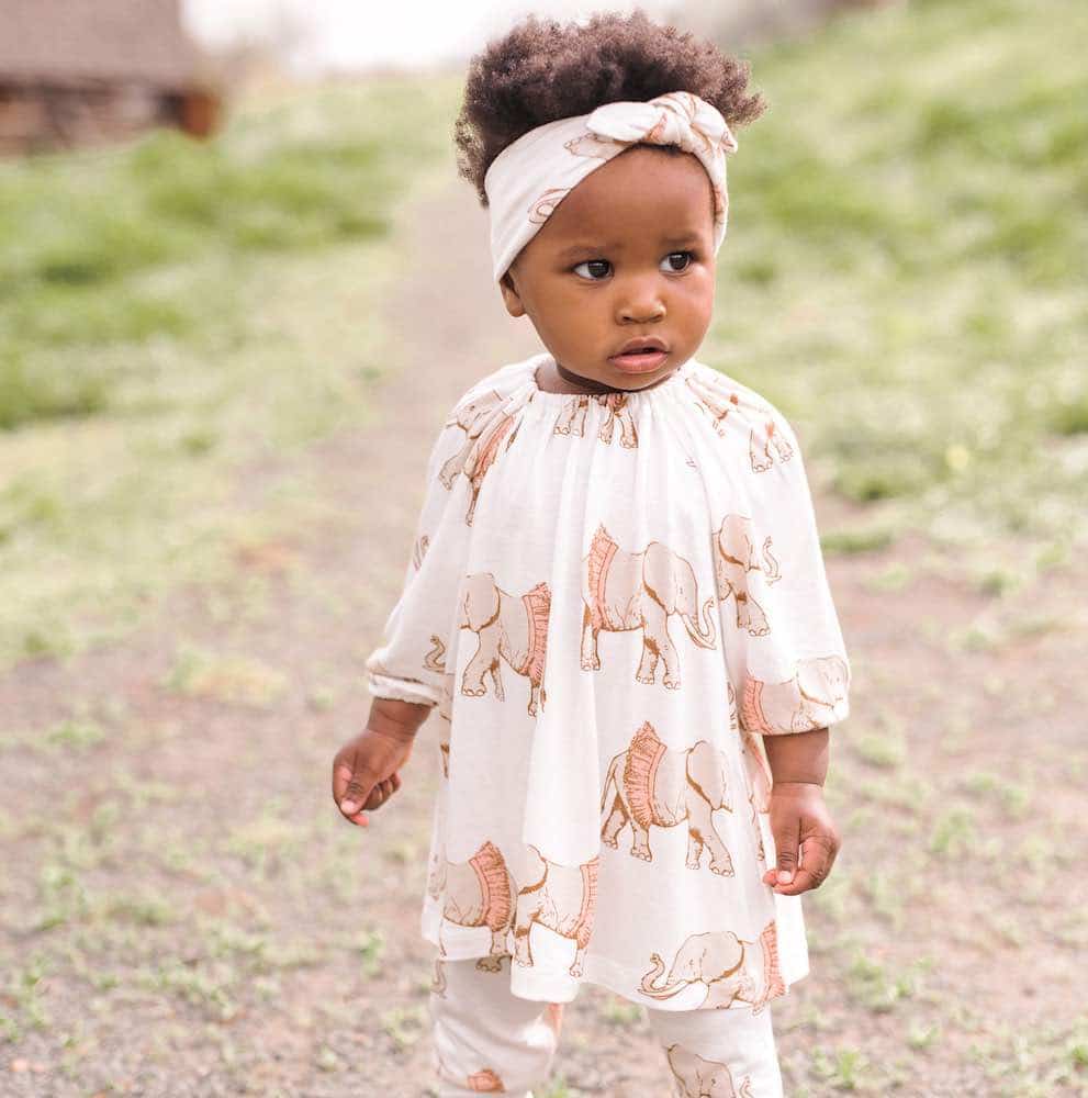 Little Girl on a Country Road on a Farm Wearing a Bamboo Long Sleeve Dress and Legging Set and Headband in the Tutu Elephant Print by Milkbarn Kids