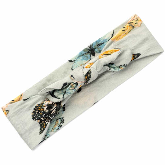 Baby girl bamboo knotted bow headband, light blue fabric with yellow, black, and blue monarch butterflies