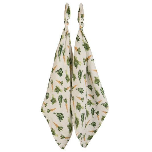Two-piece organic cotton muslin baby burp cloth set with playful carrot, spinach, and bok choy designs, soft and gentle for newborns and ideal for baby shower gifts