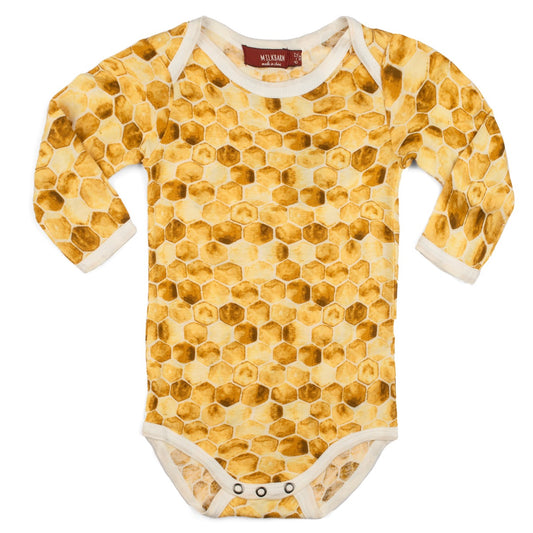 Soft and breathable bamboo long sleeve baby one piece in yellow with honeycomb and bee-inspired design