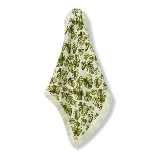 Hanging Island Leaf Bamboo Mini Lovey muslin security blanket with green leaves on white base by Milkbarn