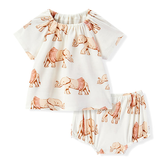 Front view of Milkbarn organic baby girl dress and bloomer outfit set in Tutu Elephant bamboo fabric, white with pink elephants in tutus