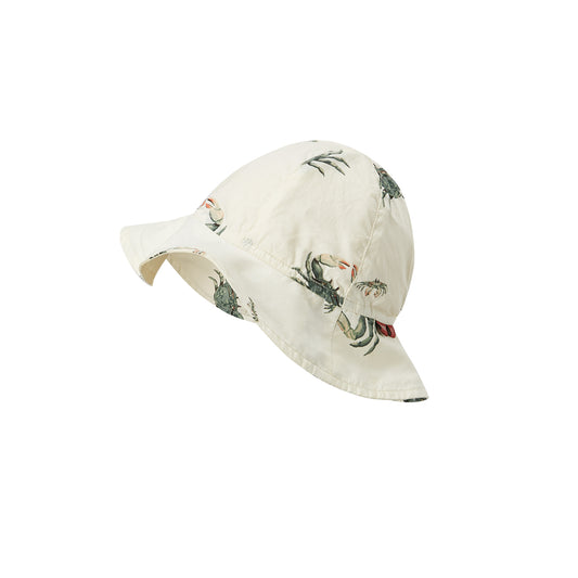 Milkbarn’s Coastal Crab Sunshine Peekaboo Hat with cheerful sea-green crabs on a neutral base, wide brim and rounded top for all-day UPF 50+ protection