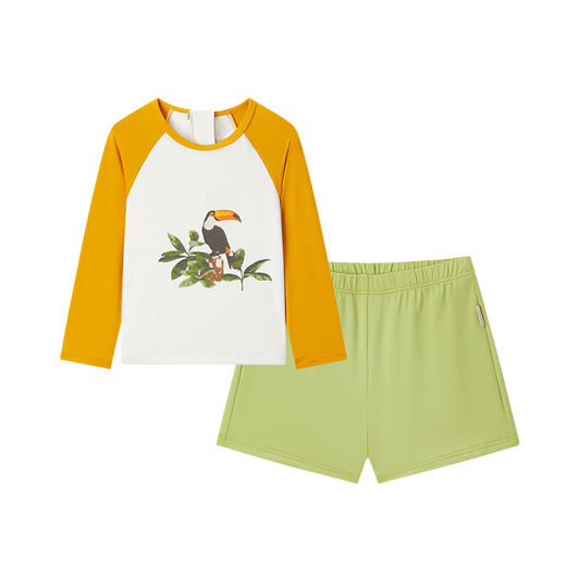 Front view of Milkbarn Island Toucan long-sleeve shirt and trunks swim set for babies and toddlers, white shirt with orange sleeves and toucan print, UPF 50+