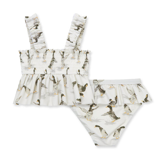 Milkbarn Duck ruffle two-piece swimsuit for babies and toddlers featuring cheerful ducks, UPF 50+ sun protection and soft stretch comfort.