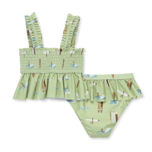 Milkbarn Summer Surf ruffle two-piece swimsuit with surfer design, UPF 50+ protection and fade-resistant stretch fabric for sunny pool or beach days.
