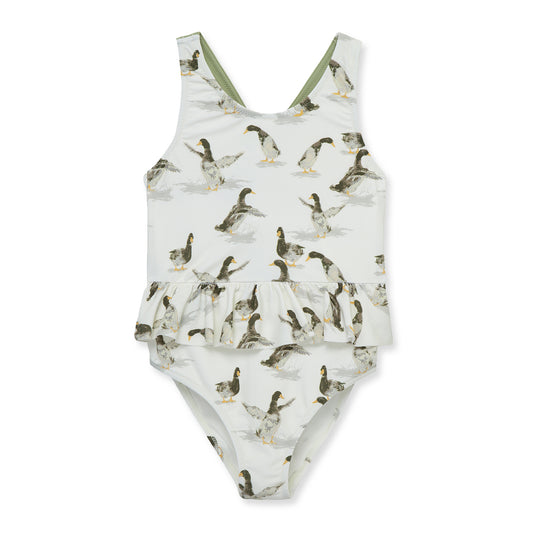 Milkbarn Duck ruffle waist cross-back one-piece swimsuit for baby and toddler girls, playful duck print, UPF 50+ nylon spandex blend for comfort.