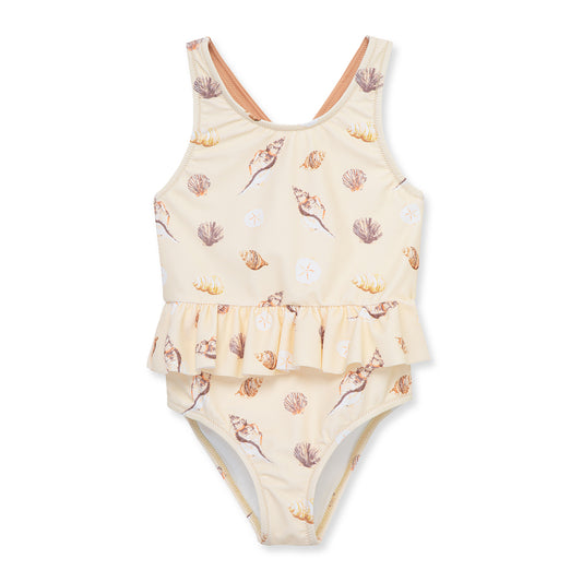 Milkbarn Seashells ruffle waist cross-back one-piece swimsuit for baby girls, pink seashell print, stretch nylon blend with UPF 50+ sun protection.