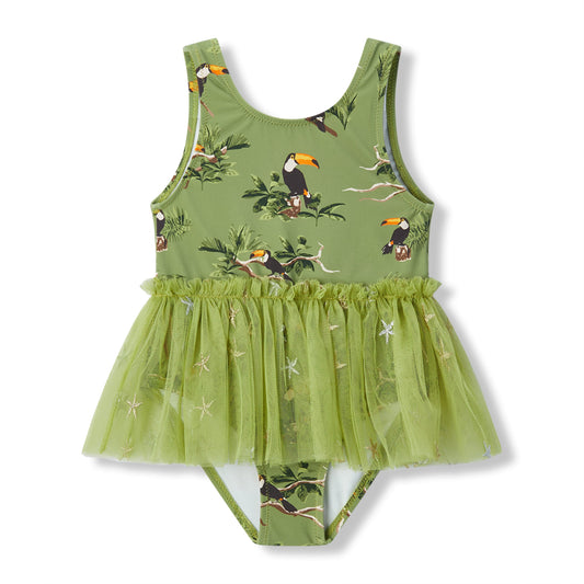 Milkbarn’s Toucan Ballet Skirt Swimsuit for girls with tropical toucans and leafy greens, crafted in a UPF 50+ nylon spandex blend for poolside play