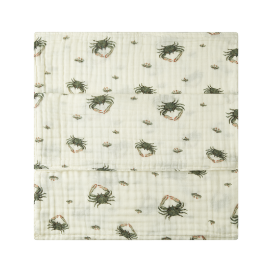 Milkbarn Coastal Crab 100% cotton baby towel featuring blue and green crabs on white, perfect for seaside, pool, or bath time fun.
