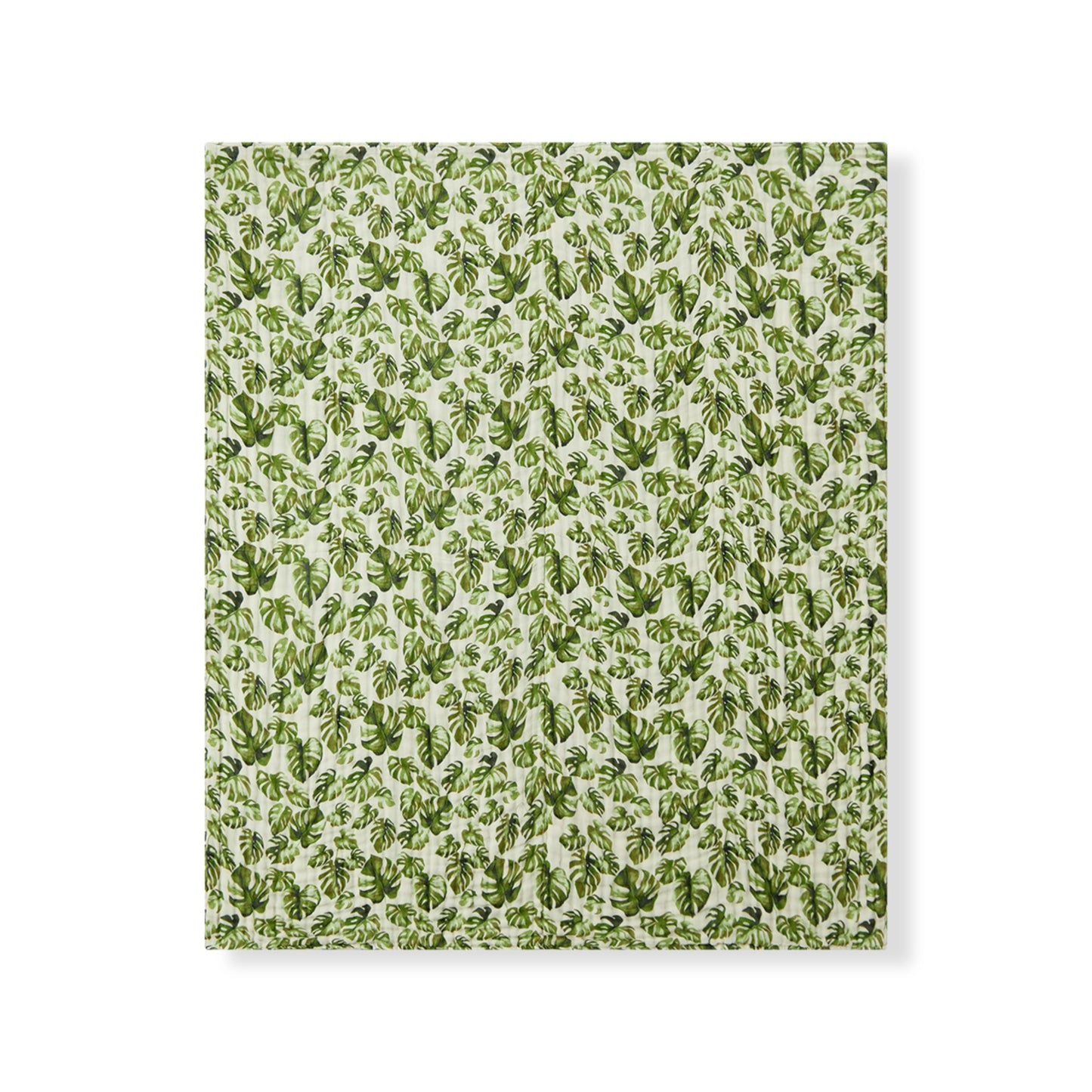 Milkbarn Island Leaf organic cotton baby towel with tropical leaf design, cozy and gentle for beach days or bedtime baths.