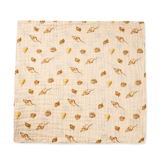 Milkbarn Seashells cotton baby towel in soft pink tones with seashell details, offering gentle absorbency for bath or swim time.