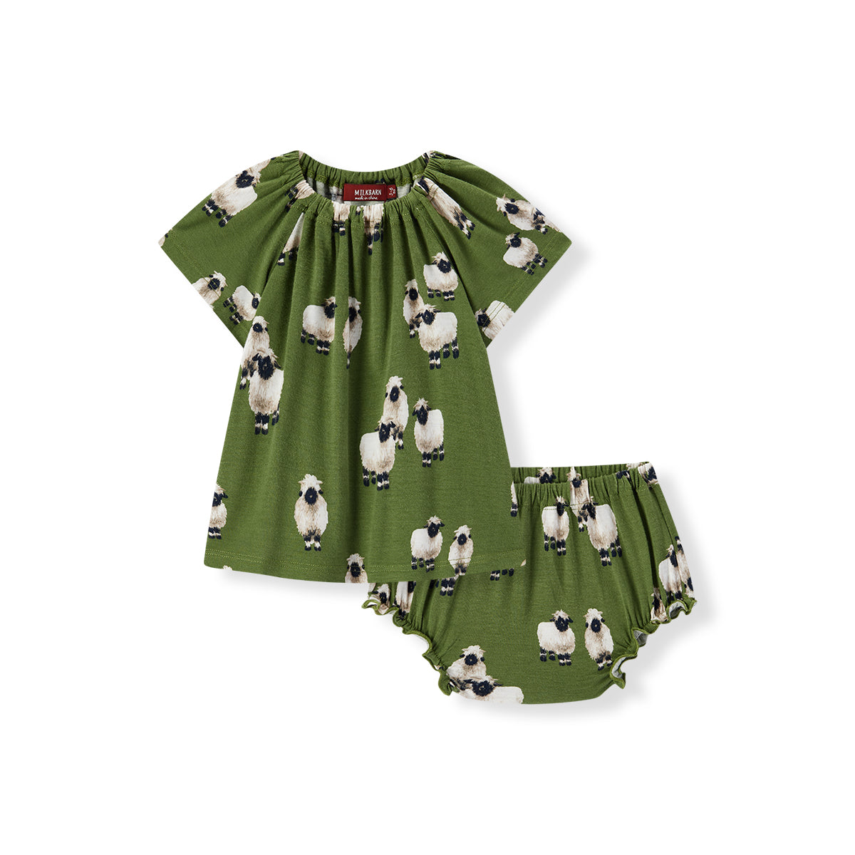 Milkbarn Valais Sheep Bamboo Dress and Bloomer Set for little girls, front view of farm-inspired outfit in green 100% rayon from bamboo with black-faced white sheep print