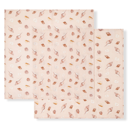 Two-piece bamboo muslin baby burp cloth set with pink seashell and sand dollar design, soft and gentle for newborns, ideal for beach-themed baby shower gifts