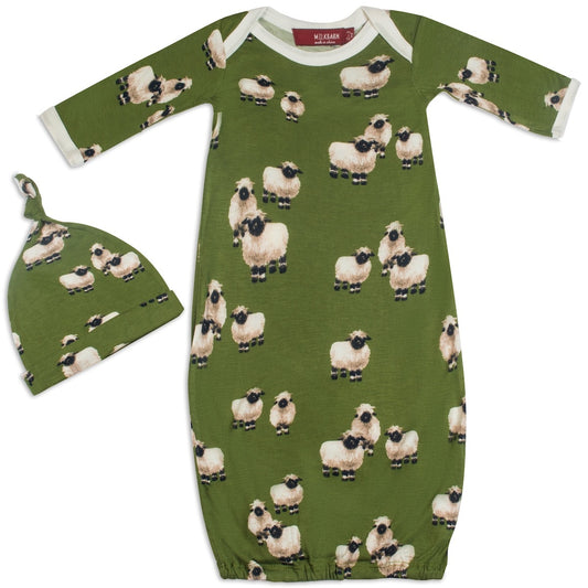 Bamboo newborn gown and hat set with cute Valais sheep design in green, white, and black, soft and breathable, perfect animal-themed baby gift
