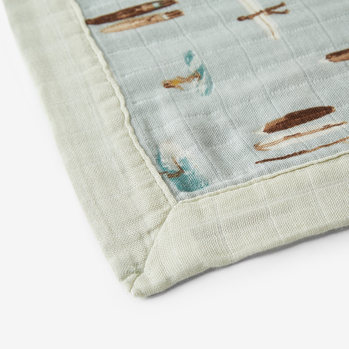 Closeup of Vintage Surf Mini Lovey muslin surf fabric and trim