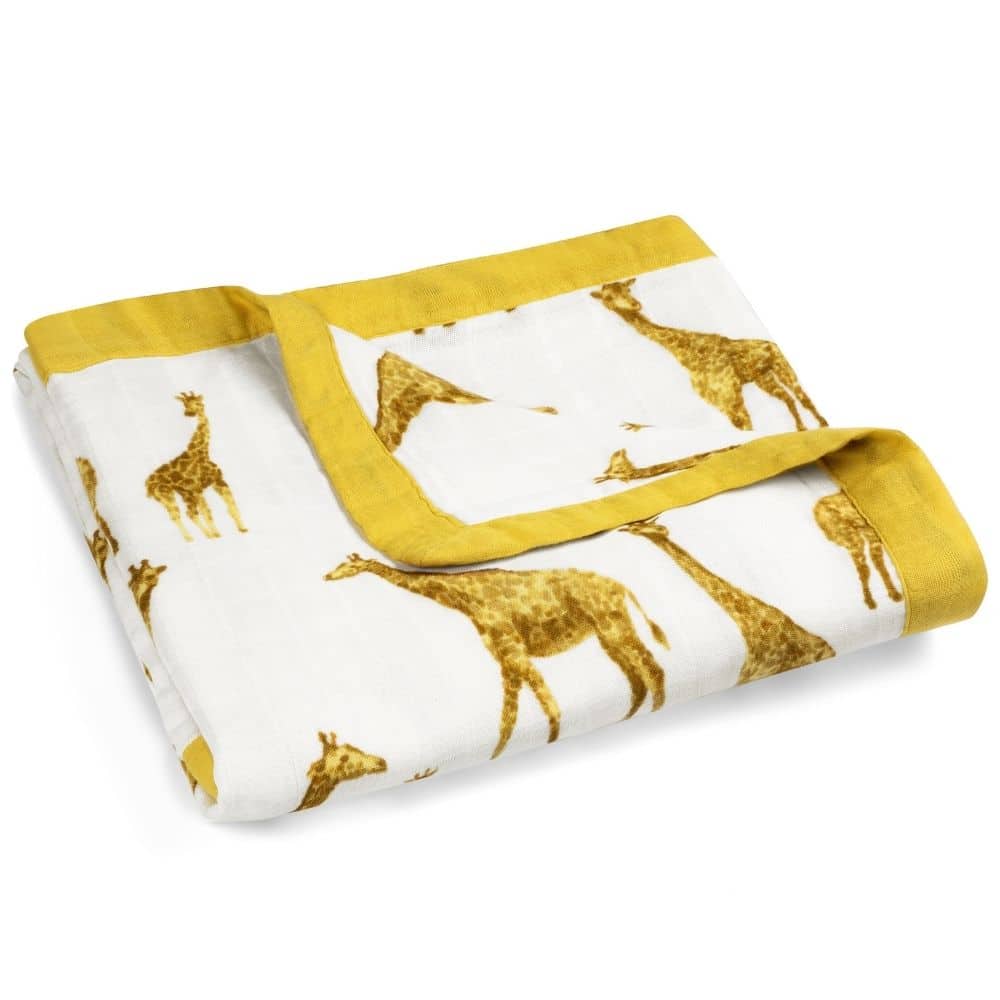 Folded Big Lovey Blanket in the Orange Giraffe Print by Milkbarn Kids