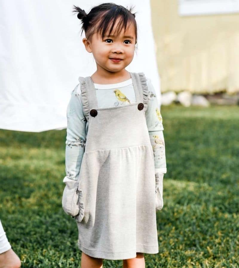Harper Group for Milkbarn Kids - Little Baby Girl in the Grey Pinstripe Dress Overall and Bamboo Long Sleeve One Piece in the Blue Bird Print by Milkbarn Kids